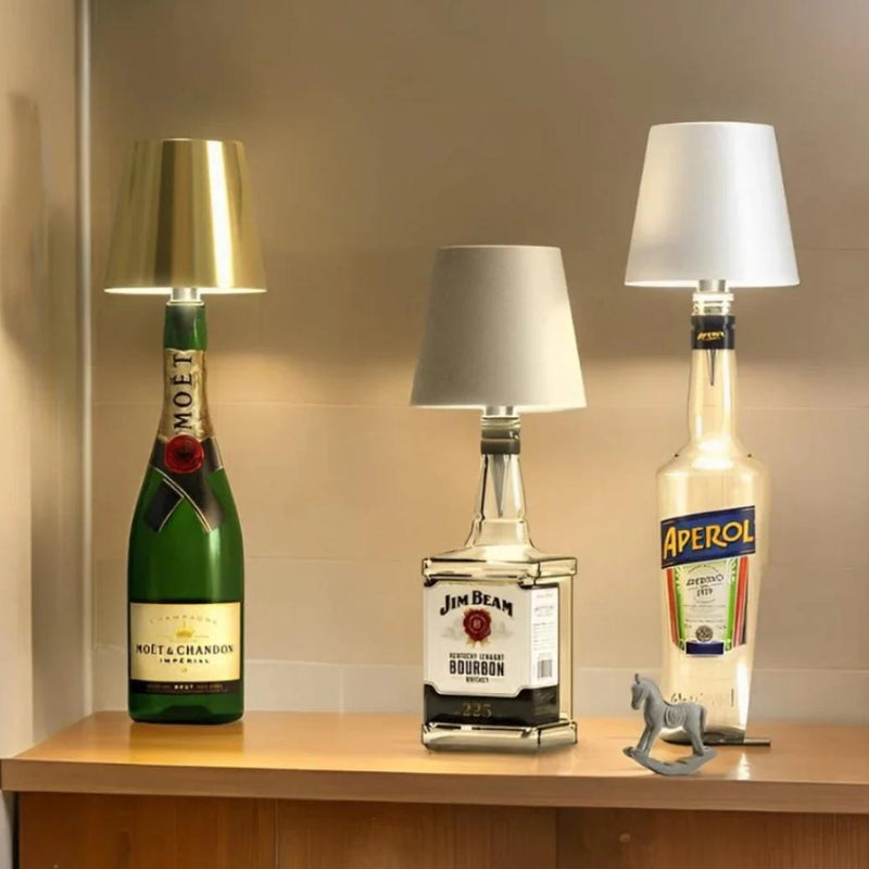 GlowBottle on three bottles Moët Jim Beam Aperol lifestyle, cordless bottle lamp
