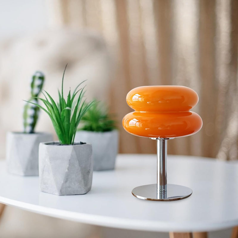 Verona Bauhaus Table Lamp illuminated on bedside table showing dimmable touch function designer bedside table lamp