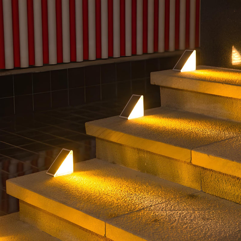 EcoGlow Outdoor Solar Path Lights installed across a garden patio demonstrating even light distribution solar garden pathway lights