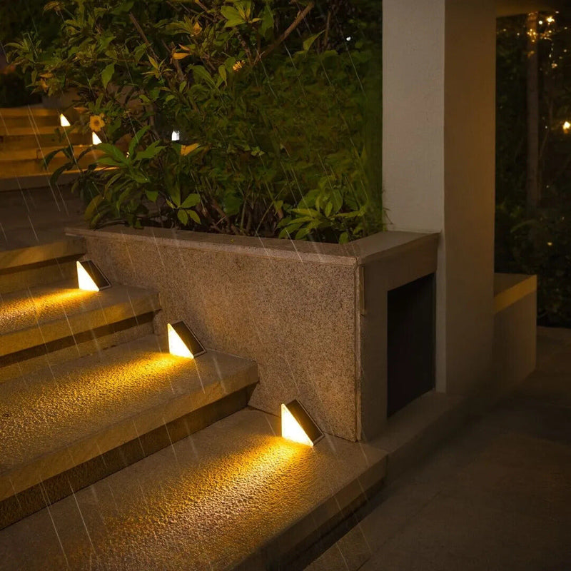 EcoGlow Outdoor Solar Path Lights illuminated step edge at night showcasing warm white lighting effect solar powered garden lights