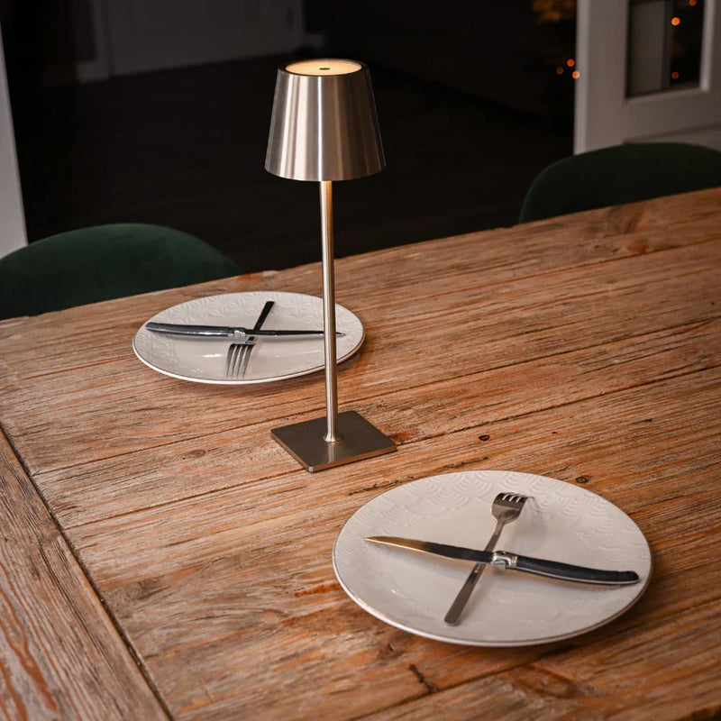 AuraLite Modern Table Lamp placed on a minimalist desk in a styled living space, scandinavian style desk lamp