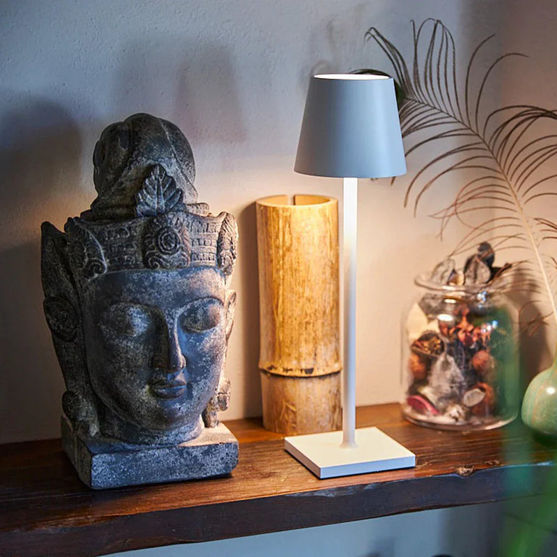 AuraLite Cordless Touch Lamp shown in use on a home office desk with dimmable warm lighting, scandinavian style desk lamp