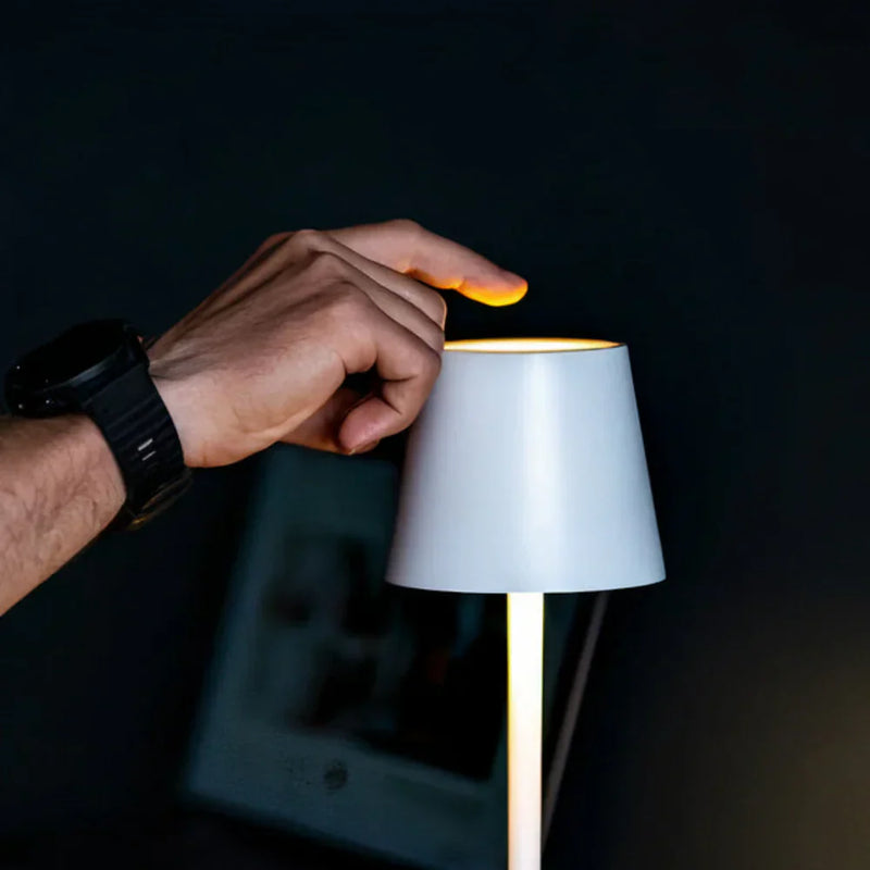 AuraLite Modern Table Lamp | Cordless Rechargeable Dimmable Touch Light in a room setting scandinavian style desk lamp