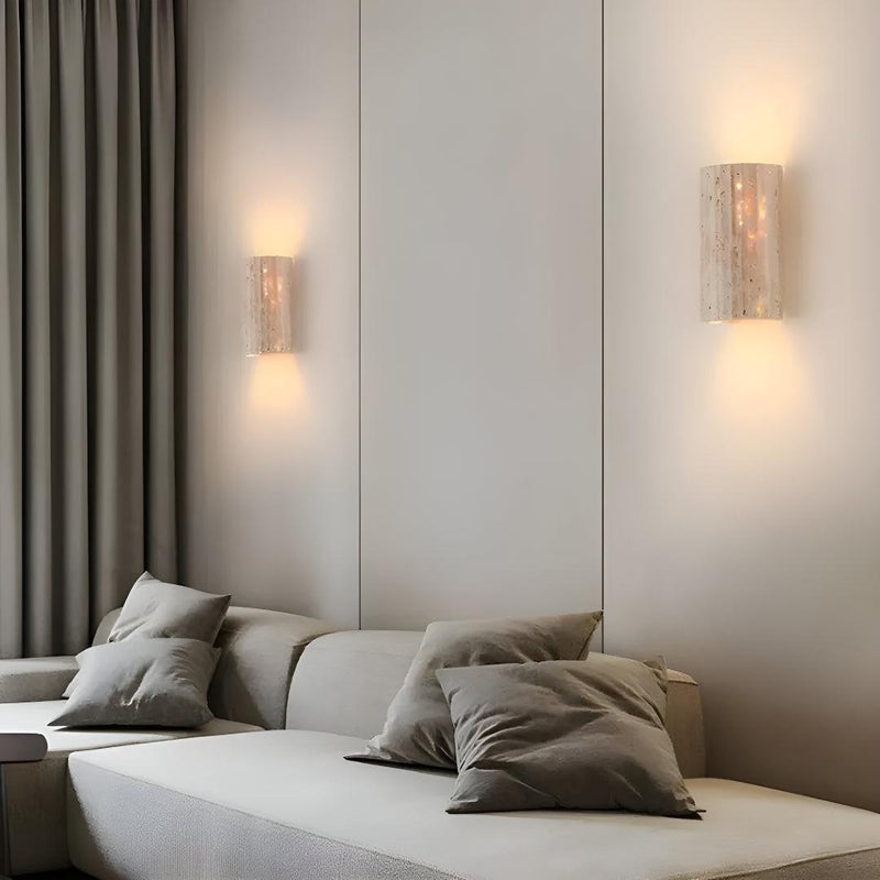 Natural Stone Wall Light mounted on interior wall emitting soft warm white ambient light natural stone wall light
