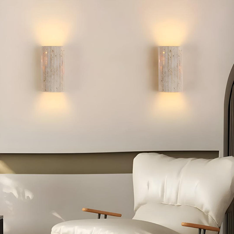 Natural Stone Wall Light front view with warm white LED glow and metal frame natural stone wall sconce