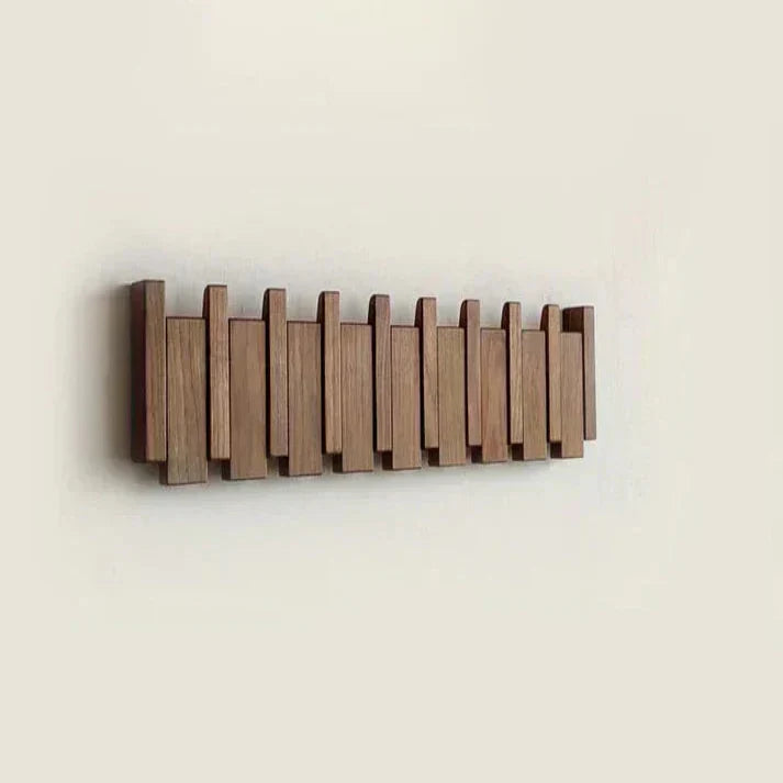 Piano wooden wall hooks, detail of the elegant hook shape