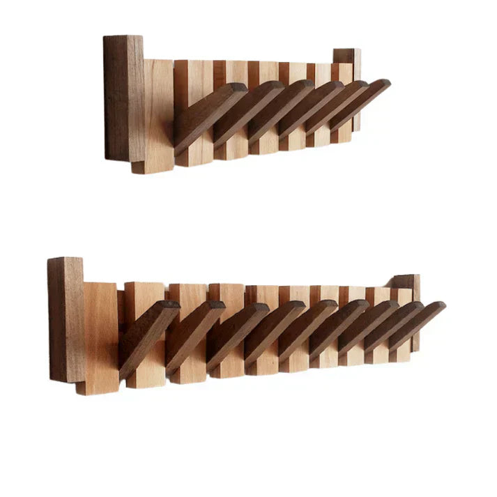 Piano wooden wall coat rack, close-up of the walnut finish