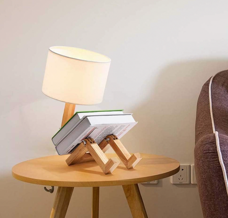 Reading lamp with wooden shelf, Scandinavian design in white on a desk