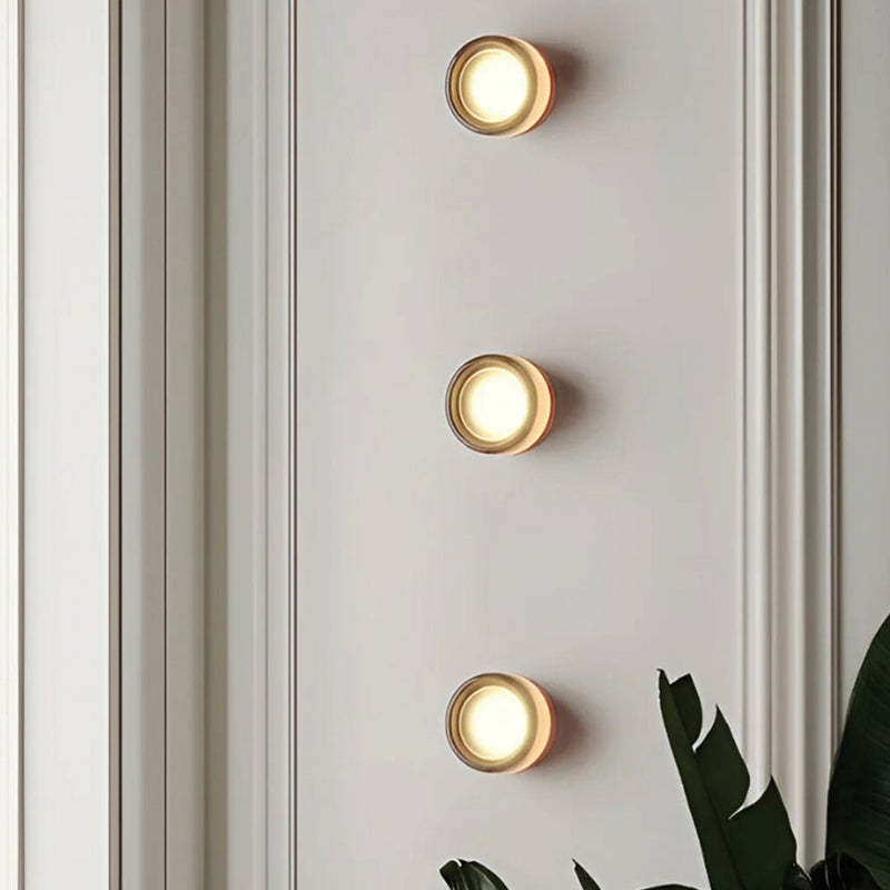 Dimple Aura glass wall light front view, elegant glass wall lamp