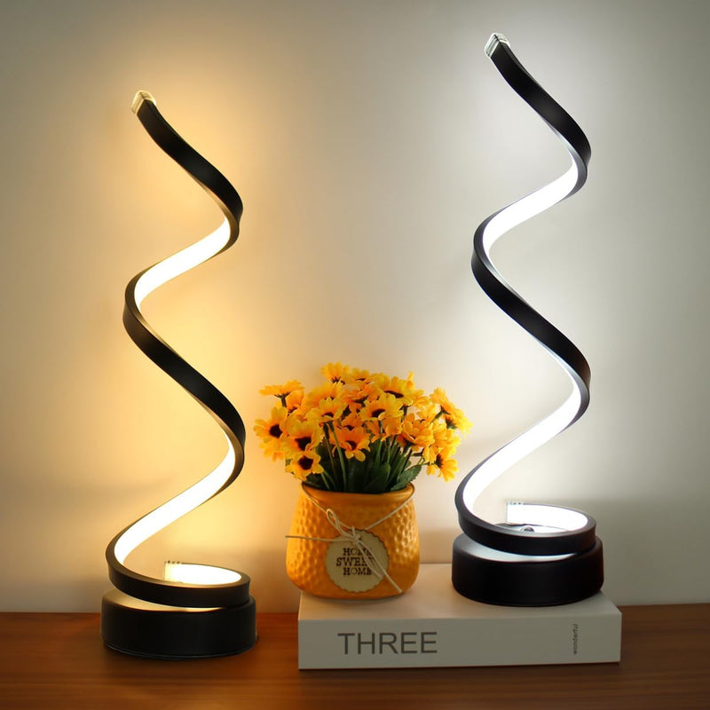 Spiral table lamp top-down view of the spiral lampshade with a warm circle of light modern bedside lamp