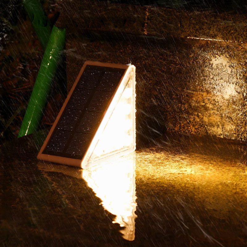 EcoGlow Outdoor Solar Path Lights | IP67 Waterproof Warm White LED Garden Step Lighting in a room setting solar powered garden lights