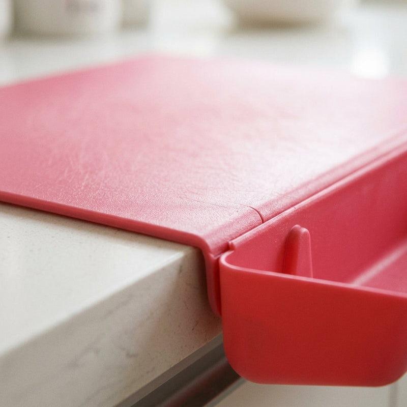 2-in-1 Chopping Board with Storage Box being used to chop vegetables with chopped pieces sliding into the detachable drawer cutting board with drawer