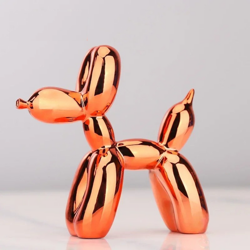 Orange balloon dog sculpture in resin