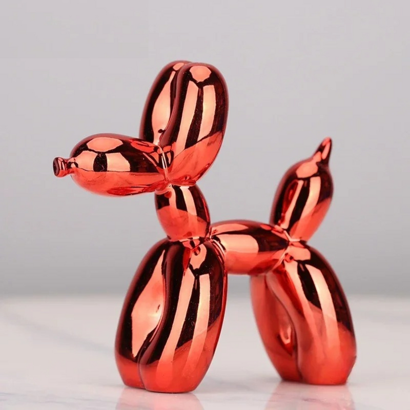 Red balloon dog sculpture in resin