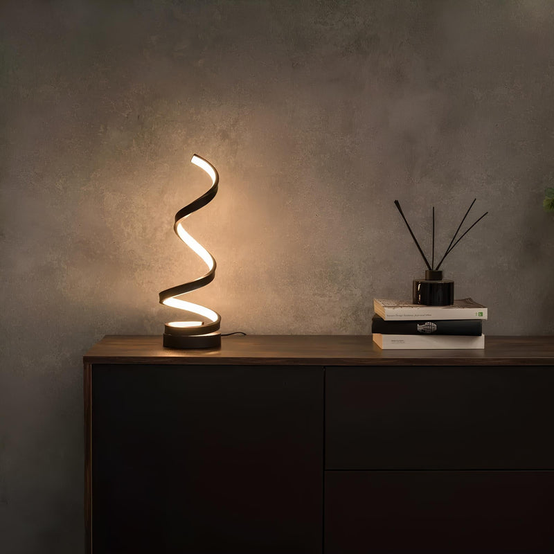 Spiral table lamp modern design with warm light on an elegant surface modern bedside lamp