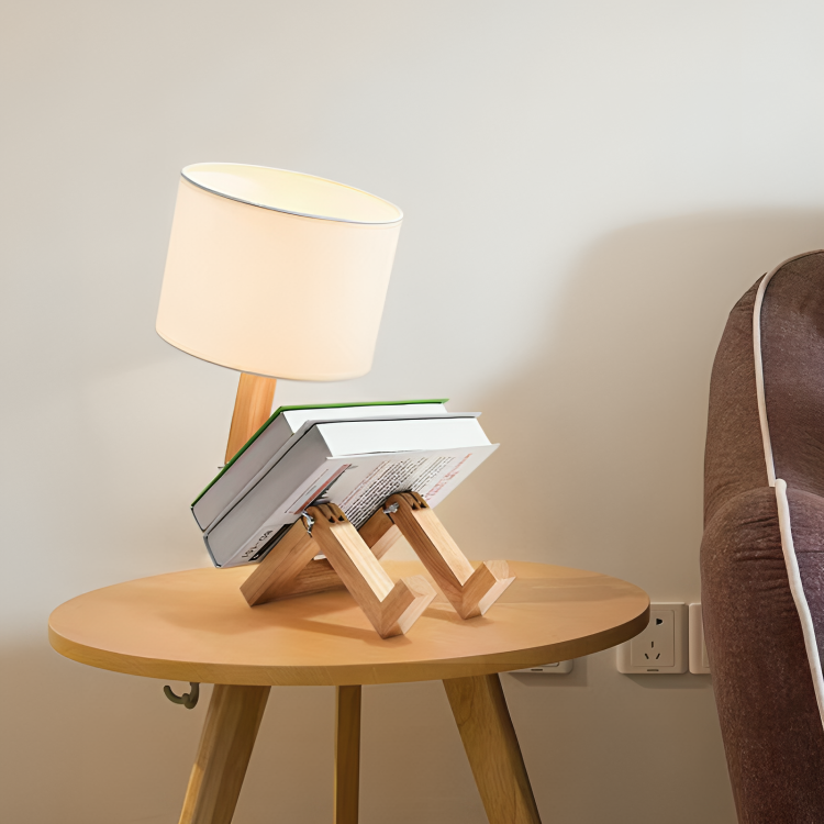 White Scandi table lamp with wooden shelf, detail of the dimmable reading light