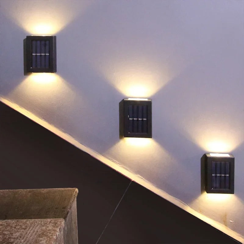 SolarFlare wall light installation example at an entrance, solar outdoor wall light