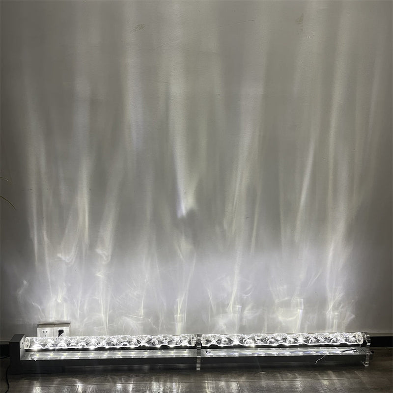 Ocean Wave projector creating a calming blue wave pattern in a darkened room, ocean light effect